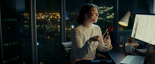 Businesswoman immersed in late-night productivity