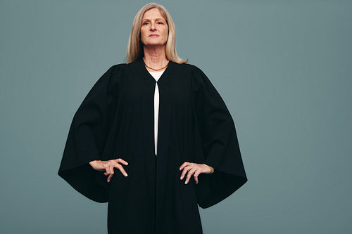 Honourable judge standing in a studio