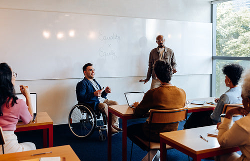 Meeting in class with wheelchair participant