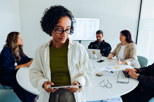 Businesswoman and diverse team in a design meeting