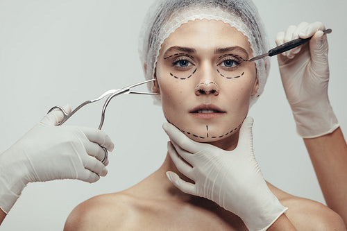 Woman having cosmetic face surgery