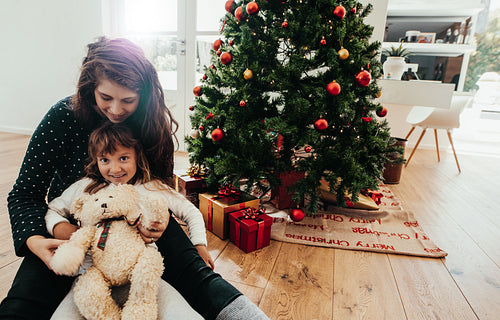 Mother and daughter celebrating Christmas.
