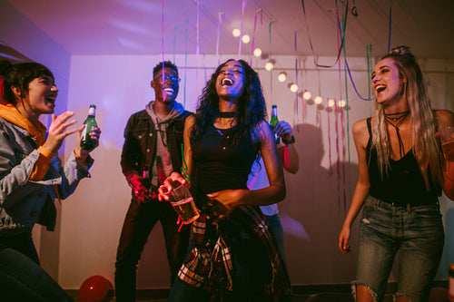 Friends laughing and dancing