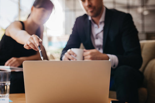 Presenting business idea on laptop