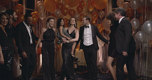 Friends coming together for a group photo in party