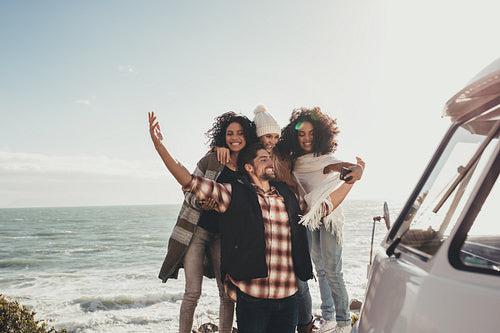 Friends taking selfie on the road trip