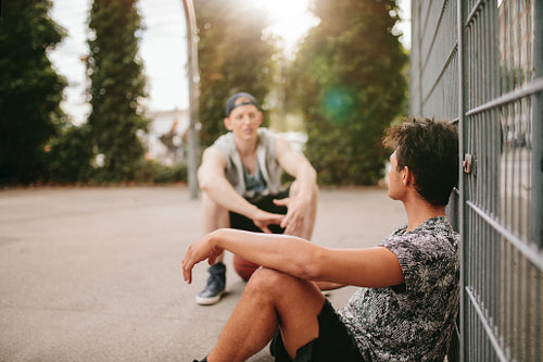 Streetball players taking break after a game
