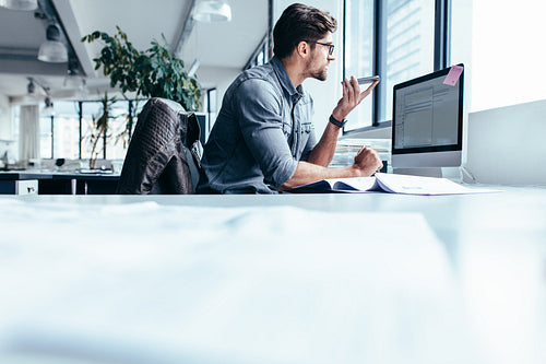 Young man working in office