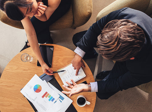 Coworkers discussing new business project