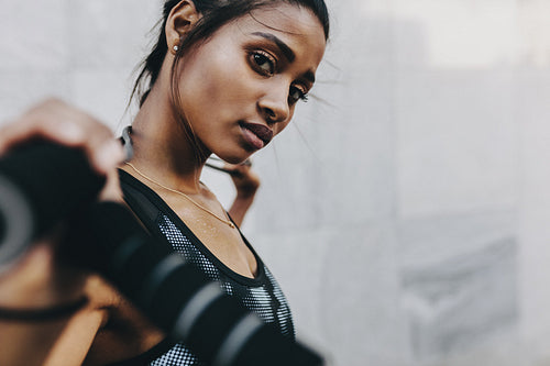 Close up of a fitness woman holding a skipping rope