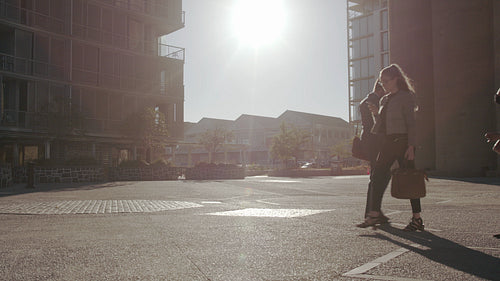 People commuting to office on a sunny morning