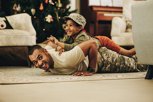 Father and son having fun together at Christmas