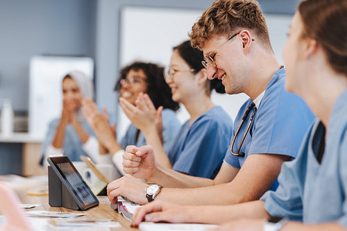 Medical students celebrating medical education and teamwork