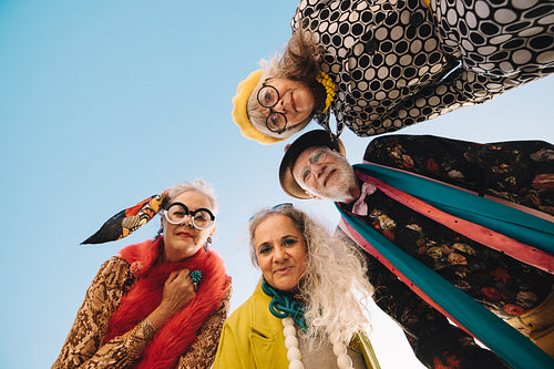 Directly below shot of senior citizens looking at the camera