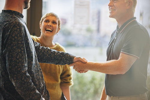 Business people handshake after a deal