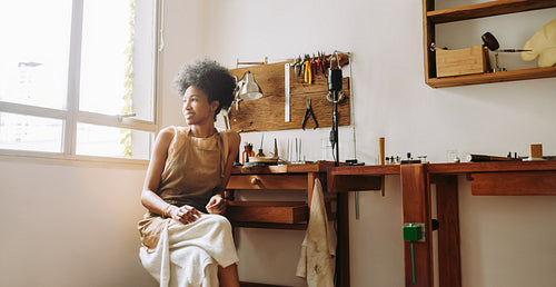 Female jewelry worker in workshop