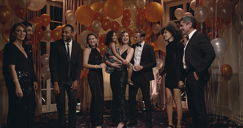 Family and friends having a group photo at gala night