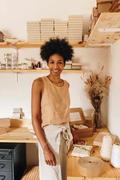 Woman running online handmade jewelry business