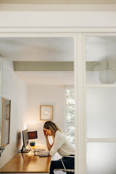 Businesswoman experiencing work fatigue
