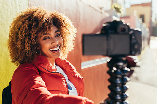 Portrait of a female traveller taking a selfie