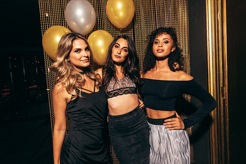 Stylish girls in the nightclub