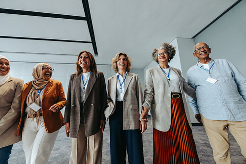 Multiethnic group of cheerful businesspeople attending a conference