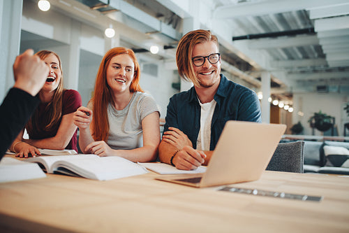Group of students studying in a library