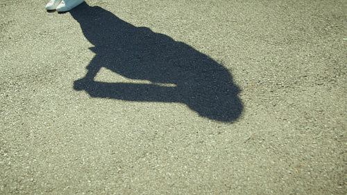 Shadow of protestor holding sign