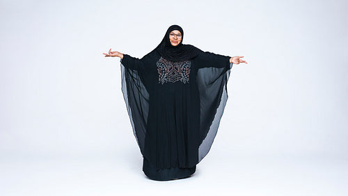 Islamic woman in hijab looking at camera