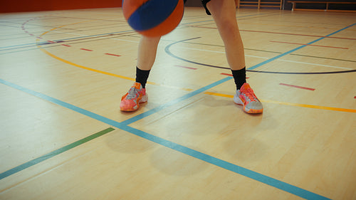 Basketball player scoring a basket