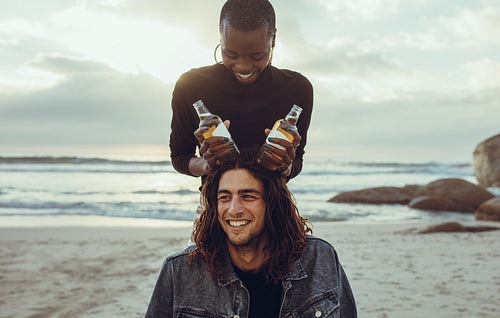 Couple of friends enjoying themselves at the beach