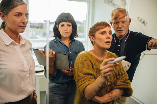 Businesswoman leading a brainstorming session with his colleague