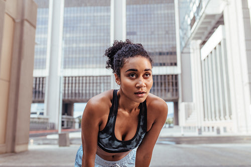 Woman taking a break during physical training