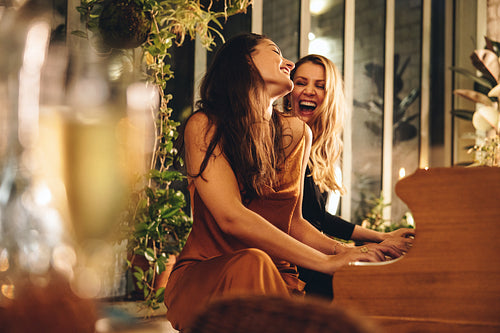 Enjoying playing the hotel piano