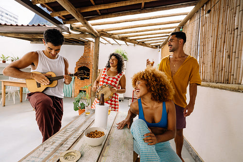 Friends enjoying a roda de samba gathering in Rio de Janeiro