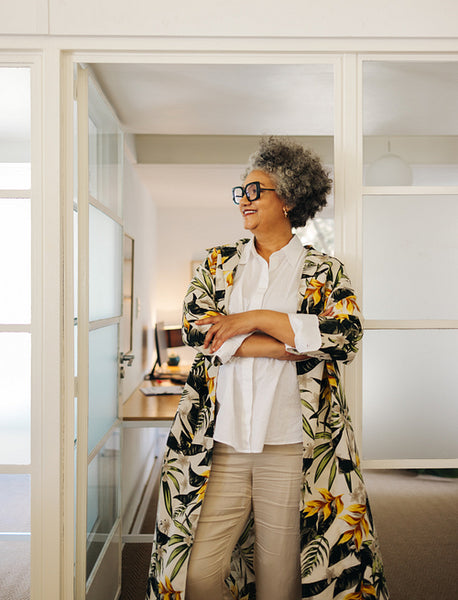 Mature businesswoman looking away with a smile