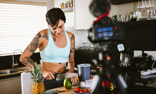 Woman creating a vlog about healthy eating
