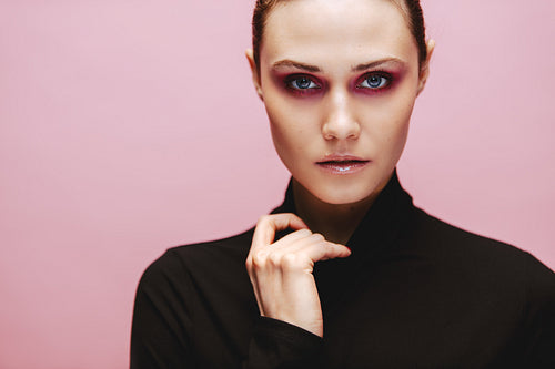 Stunning female model with artistic makeup