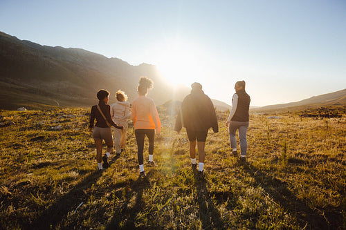 Group walking together in scenic nature