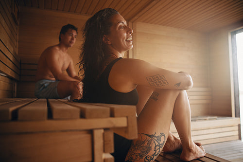 People relax in a community-based sauna session with focus on wellness