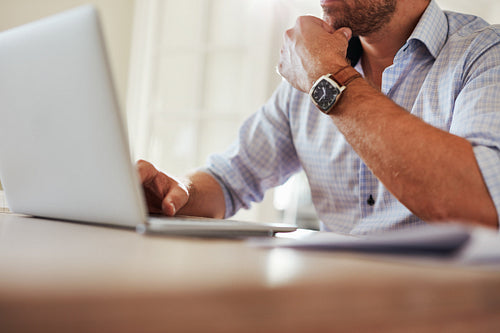 Young man working on laptop
