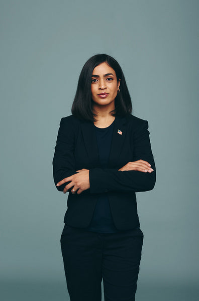 Confident congresswoman standing in a studio