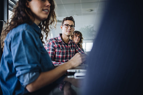 Businessman attending strategy meeting in boardroom