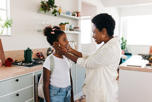 Mom and her daughter sharing a happy morning routine