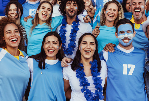 Excited Argentinian soccer supporters in stands