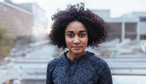 Portrait of a young woman runner