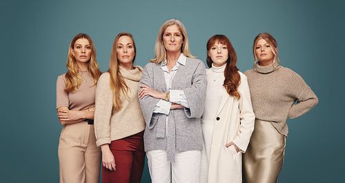 White women of different ages standing together