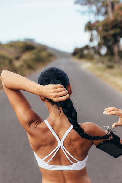 Woman getting ready training session outdoors
