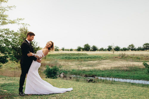 Beautiful bride and groom in a park.