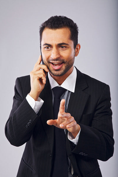 Businessman Having a Conversation on Phone